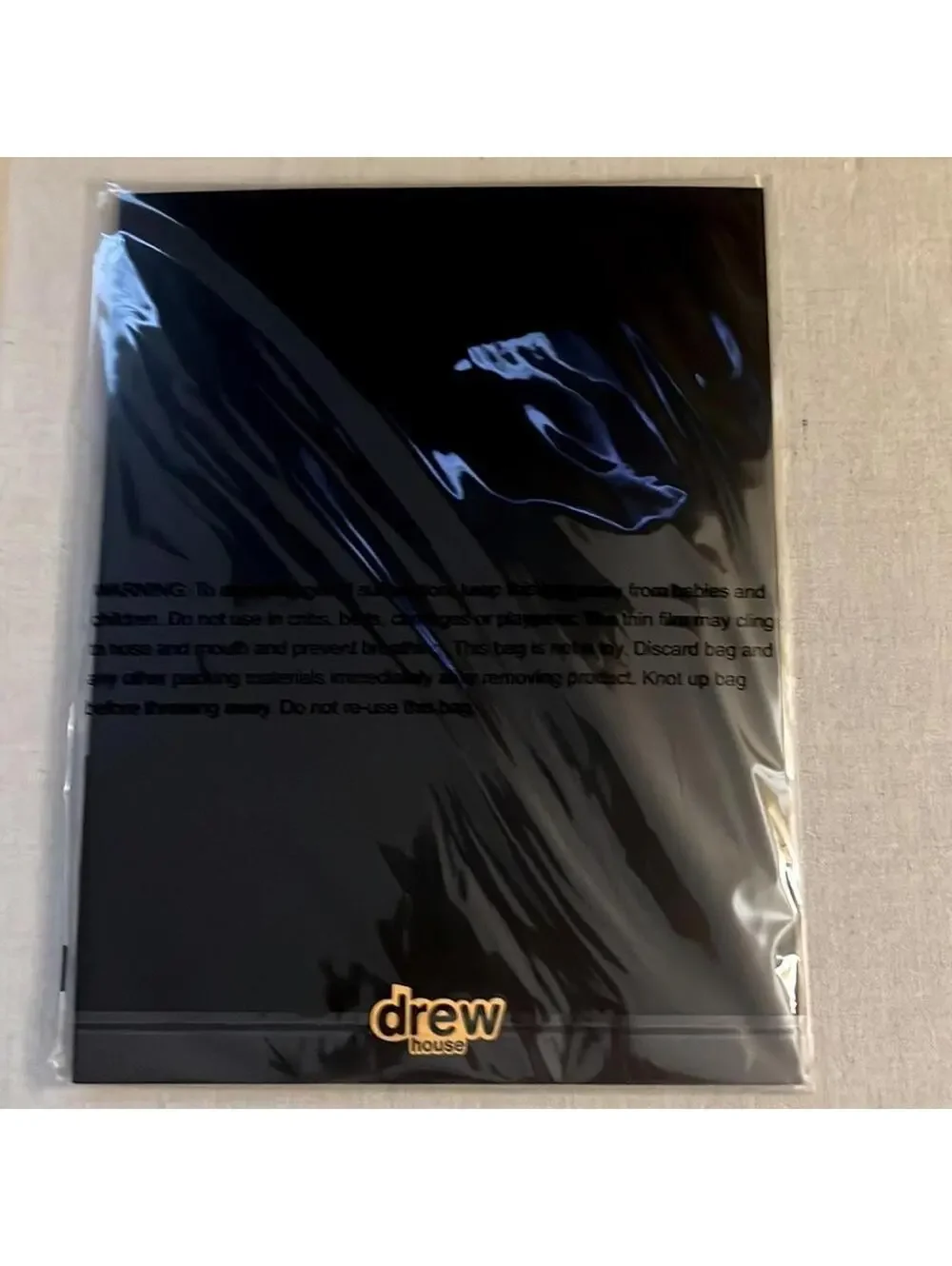 Drew House Black 2 pocket folder with mascot logo on front NWT